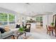 Open concept features vaulted ceilings and a view into the kitchen at 141 Springbrooke Trl, Dallas, GA 30157