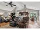 Open-concept living room flows into the kitchen and dining area at 141 Springbrooke Trl, Dallas, GA 30157