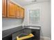 Office area features built-in desk and natural light at 141 Springbrooke Trl, Dallas, GA 30157