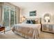Bright bedroom with a large window, plush bedding, and stylish decor at 1430 Dresden Ne Dr # 230, Brookhaven, GA 30319