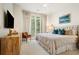 Bright bedroom with a large window, plush bedding, and stylish decor at 1430 Dresden Ne Dr # 230, Brookhaven, GA 30319