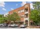Charming brick building with multiple balconies and attractive street-side parking at 1430 Dresden Ne Dr # 230, Brookhaven, GA 30319