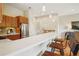 Modern kitchen featuring stainless steel appliances and a breakfast bar with seating at 1430 Dresden Ne Dr # 230, Brookhaven, GA 30319