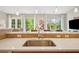 Bright kitchen area overlooking the dining area and living space, featuring stone countertops at 1430 Dresden Ne Dr # 230, Brookhaven, GA 30319