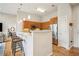 Spacious kitchen area with barstool seating, stainless steel appliances, and open access to the living room at 1430 Dresden Ne Dr # 230, Brookhaven, GA 30319