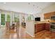 Spacious living area with views of the dining area and kitchen, offering an open concept layout at 1430 Dresden Ne Dr # 230, Brookhaven, GA 30319