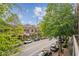 Residential street showcasing beautiful architecture and mature trees at 1430 Dresden Ne Dr # 230, Brookhaven, GA 30319