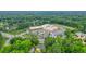 Aerial view of home near neighborhood school with ample parking and surrounded by trees at 2801 Holly Oaks Dr, Marietta, GA 30062