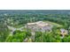Expansive aerial view features a large school surrounded by lush greenery and a well-maintained parking lot at 2801 Holly Oaks Dr, Marietta, GA 30062