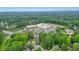 Aerial view of home near neighborhood school with ample parking and surrounded by trees at 2801 Holly Oaks Dr, Marietta, GA 30062