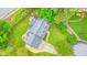 Aerial view of home with expansive driveway and beautiful lawn, featuring a well-maintained roof at 2801 Holly Oaks Dr, Marietta, GA 30062