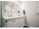 Elegant bathroom featuring a double vanity, modern lighting, and a neutral color scheme at 2801 Holly Oaks Dr, Marietta, GA 30062