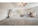 A spacious bedroom boasts neutral walls, plush gray carpeting, and a comfortable king-size bed at 2801 Holly Oaks Dr, Marietta, GA 30062