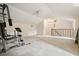 Bonus room featuring a staircase and a carpeted floor is equipped for fitness activities at 2801 Holly Oaks Dr, Marietta, GA 30062