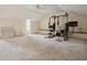 An expansive bonus room with a ceiling fan provides ample space for recreational activities at 2801 Holly Oaks Dr, Marietta, GA 30062