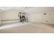 A home gym with exercise equipment beneath an angled ceiling at 2801 Holly Oaks Dr, Marietta, GA 30062