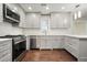 Sleek kitchen design with stainless steel appliances, ample storage, and a subway tile backsplash at 2801 Holly Oaks Dr, Marietta, GA 30062