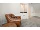 An inviting sitting area with a comfortable leather chair and a convenient wet bar at 2801 Holly Oaks Dr, Marietta, GA 30062