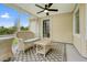A sunroom provides a cozy space with comfortable seating and natural light at 2801 Holly Oaks Dr, Marietta, GA 30062
