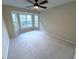 Bedroom featuring a large bay window at 310 Bloomfield Ct, Roswell, GA 30075