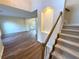 Spacious living room with hardwood floors, decorative columns, and ample natural light at 310 Bloomfield Ct, Roswell, GA 30075