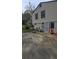 Home with outdoor space featuring patio area, grill, patio furniture, and utility access door at 4064 Sunset Dr, Atlanta, GA 30331