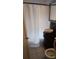 Cozy bathroom featuring a stylish vanity, shower and toilet at 4064 Sunset Dr, Atlanta, GA 30331