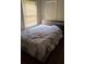 Comfortable bedroom with a window and a full size bed at 4064 Sunset Dr, Atlanta, GA 30331