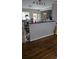 Kitchen featuring a breakfast bar and seamless access to other living areas at 4064 Sunset Dr, Atlanta, GA 30331