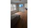 Inviting living room with hardwood floors and a large window at 4064 Sunset Dr, Atlanta, GA 30331
