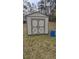 Exterior of a well-maintained outdoor shed with double doors, offering additional storage space at 4064 Sunset Dr, Atlanta, GA 30331