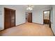 Well-lit bedroom showcasing light-colored wood flooring and neutral wall paint at 110 Otelia Ln, Covington, GA 30014