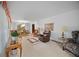 Spacious living room with plush carpeting, large windows, and elegant furnishings at 110 Otelia Ln, Covington, GA 30014