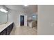Bright bathroom featuring double vanity, soaking tub, and tiled walk-in shower at 245 Brickstone Pkwy, Covington, GA 30016