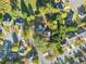 Overhead view of a home nestled in a well-established neighborhood with mature trees at 2490 Turtle Ter, Grayson, GA 30017