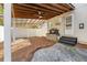 A covered back patio shows flagstone pavers and a grill at 2490 Turtle Ter, Grayson, GA 30017