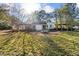 The backyard features a large lawn, gazebo and flagstone patio at 2490 Turtle Ter, Grayson, GA 30017