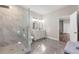 Bathroom featuring glass shower, double vanity and tile flooring at 2490 Turtle Ter, Grayson, GA 30017