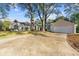 Charming single-story home with a large driveway and well-maintained lawn at 2490 Turtle Ter, Grayson, GA 30017