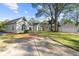 Inviting single-story home featuring a detached garage and well-manicured front yard at 2490 Turtle Ter, Grayson, GA 30017