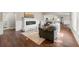 Bright living room featuring a cozy fireplace, and stylish decor at 2490 Turtle Ter, Grayson, GA 30017