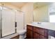 Bathroom featuring a glass-enclosed shower, wood-look flooring, and modern vanity at 507 Highwood Ln, Atlanta, GA 30344