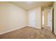 Neutral bedroom with beige carpet and white trim at 507 Highwood Ln, Atlanta, GA 30344