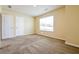Spacious bedroom with neutral carpeting and ample natural light from the large window at 507 Highwood Ln, Atlanta, GA 30344
