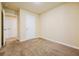 Cozy bedroom featuring neutral carpet and a closet for ample storage at 507 Highwood Ln, Atlanta, GA 30344