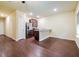 Open-concept kitchen with stainless steel appliances, dark cabinets, and granite countertops at 507 Highwood Ln, Atlanta, GA 30344