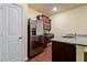 Kitchen featuring granite countertops, stainless steel appliances, and dark wood cabinets at 507 Highwood Ln, Atlanta, GA 30344