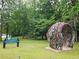 Unique art installation at Southside Park surrounded by lush greenery and trees at 571 Hancock Se Dr, Atlanta, GA 30354