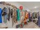 Spacious walk-in closet featuring built-in shelving and ample storage for clothes and shoes at 571 Hancock Se Dr, Atlanta, GA 30354