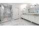 Elegant bathroom featuring marble walk-in shower and double vanity with marble countertop at 893 E Rock Springs Ne Rd, Atlanta, GA 30306